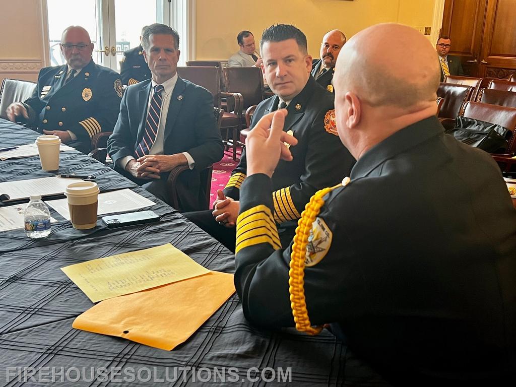 Battalion Chief John Sly speaking with members of Congress during Breakfast on the Hill. February 2025. 