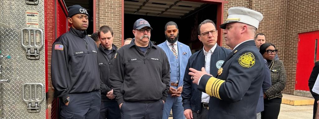 Fire Commissioner John-Paul Shirley speaks with Governor Josh Shapiro. March 2024.
